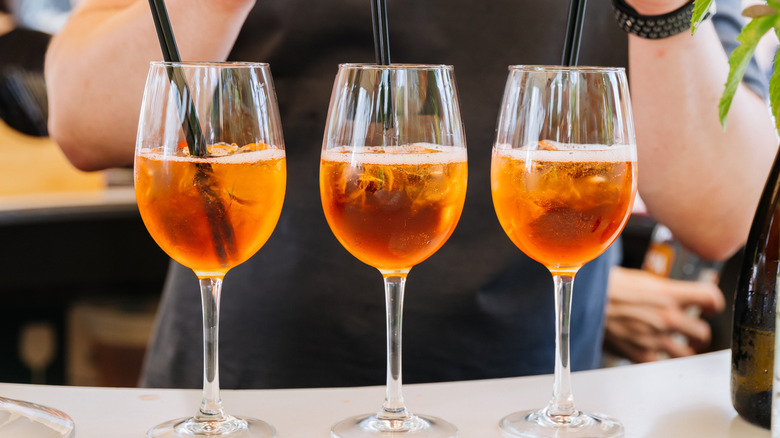 Three cocktails prepared with non-alcoholic amari