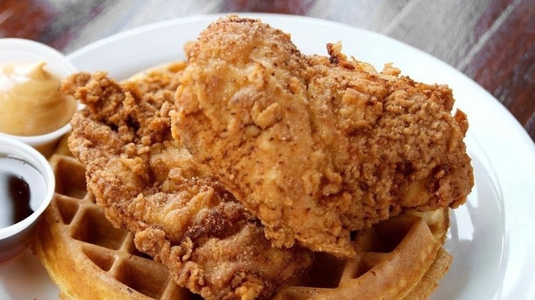 Chicken and waffles on plate