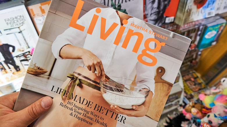 Martha Stewart Living magazine in hand