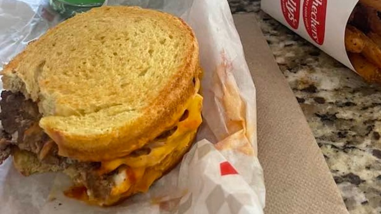 Checkers and Rally's Sourdough Double Melt on paper wrapper