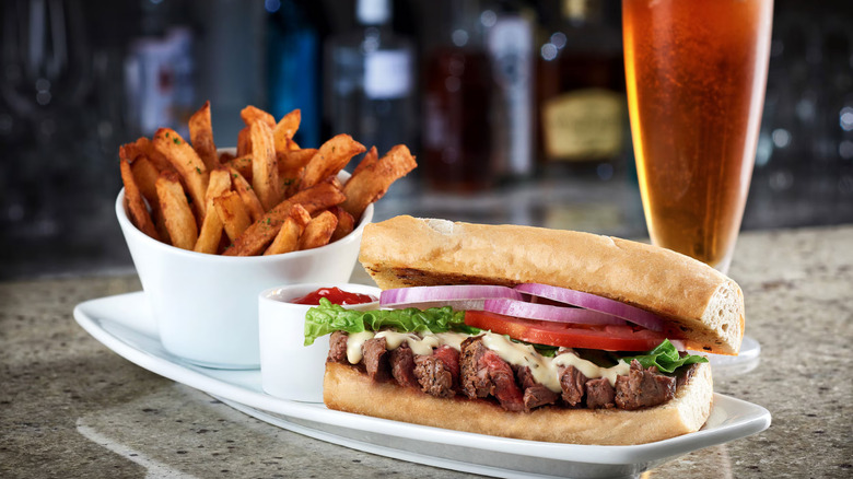 Ruth's Chris steak sandwich and fries happy hour meal