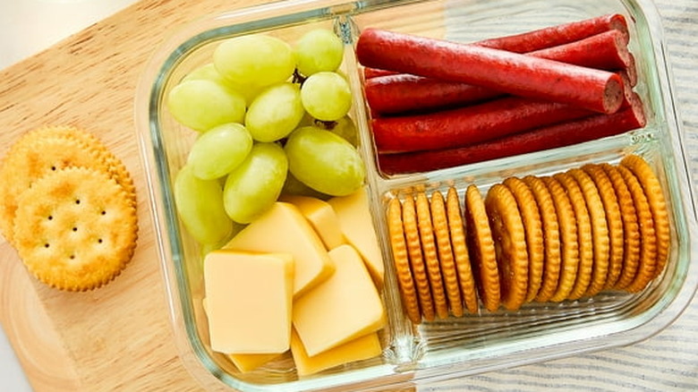 Great Value Buttery Round Crackers in a container of snacks