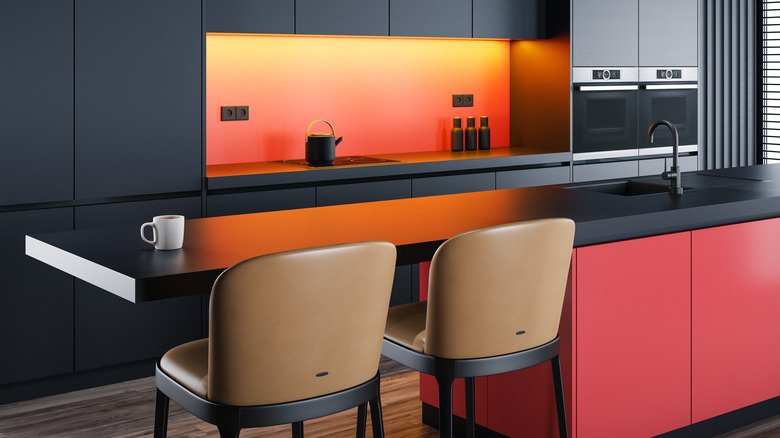 Kitchen with black and red melamine cabinets