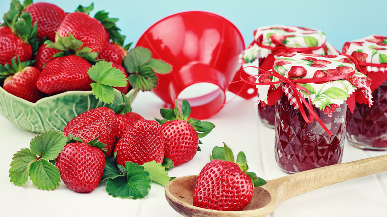 Fresh strawberries jam canning funnel  