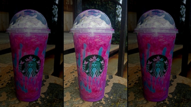 Mirrored image of The Unicorn Frappuccino on a table outside