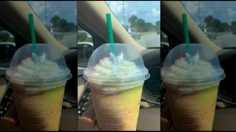 Image of Tie-Dye Frappuccino with front of car in the background