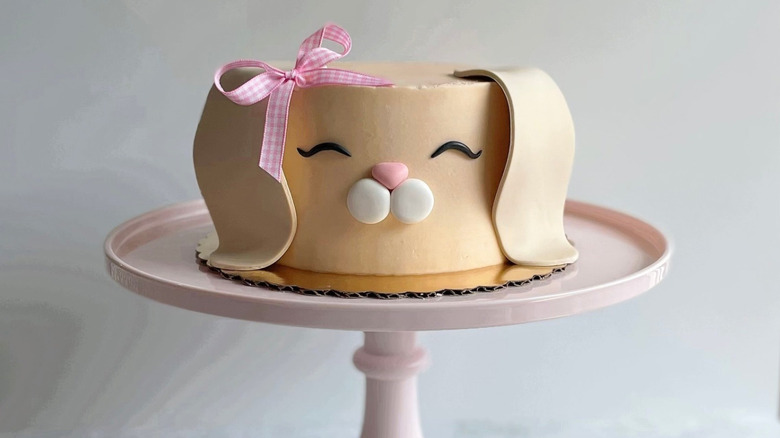 adorable custom bunny cake from Sugar Blossom Bake Shop on pedestal stand