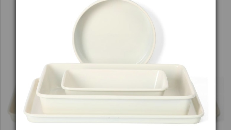 Set of Martha Stewart metal pans on white background