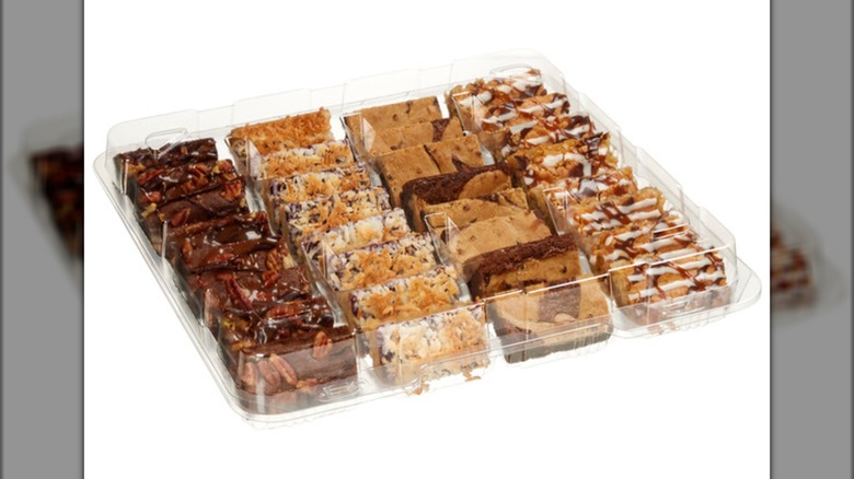 Bakery dessert tray against white background