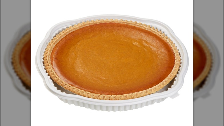 Pumpkin pie on white background