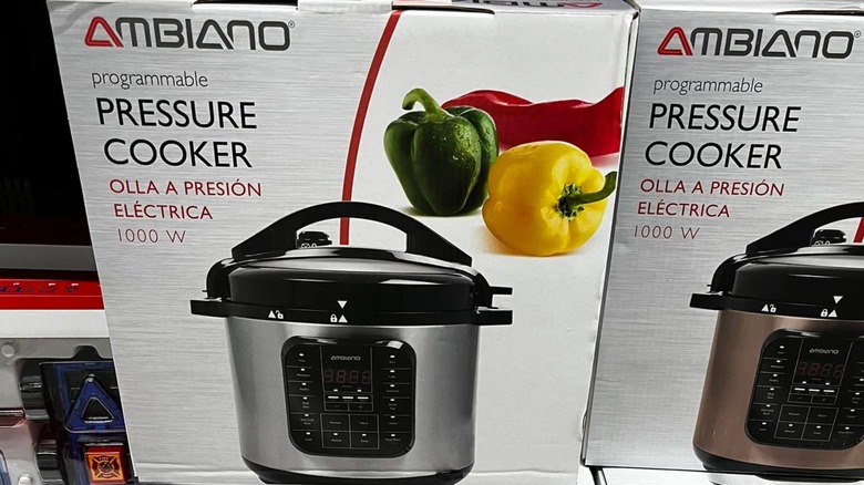 Boxes of Ambiano Pressure cookers on an Aldi shelf