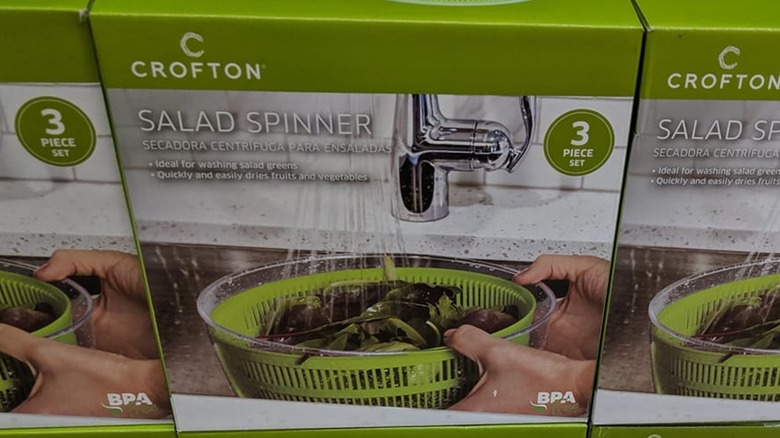 Box for Crofton salad spinner with salad being washed in spinner on box