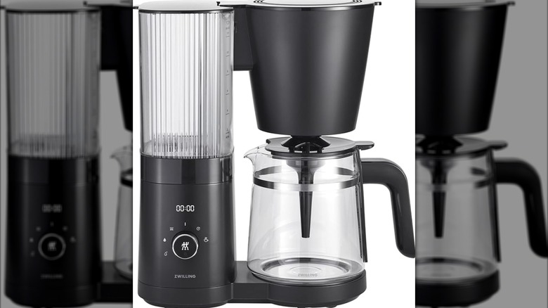 The Zwilling Enfinigy with a glass carafe isolated on a white background