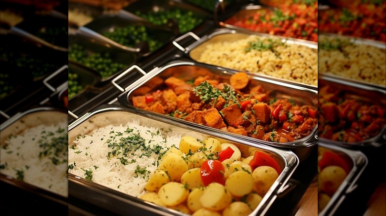 Assrtoment of dishes in silver buffet trays