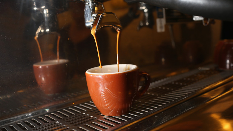 Espresso pouring from machine