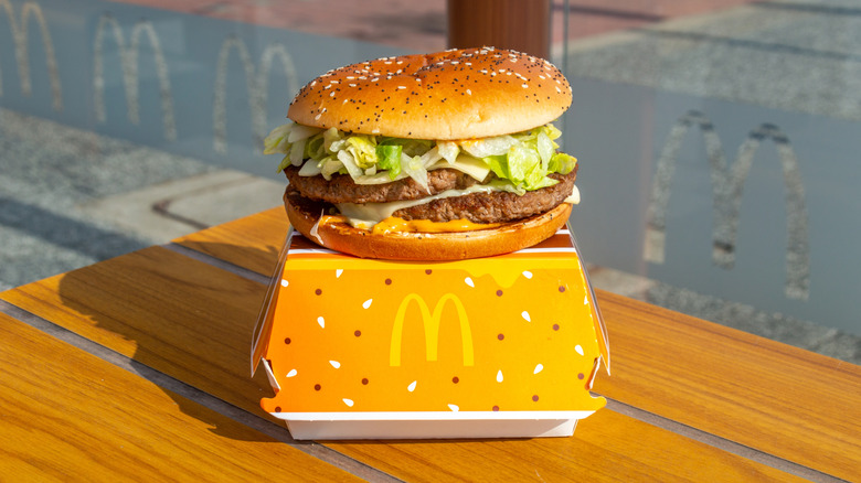 McDonalds Big Arch burger on top of box on table