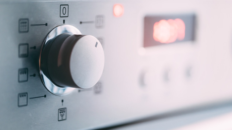 A close up of a modern oven control pabel without any branding