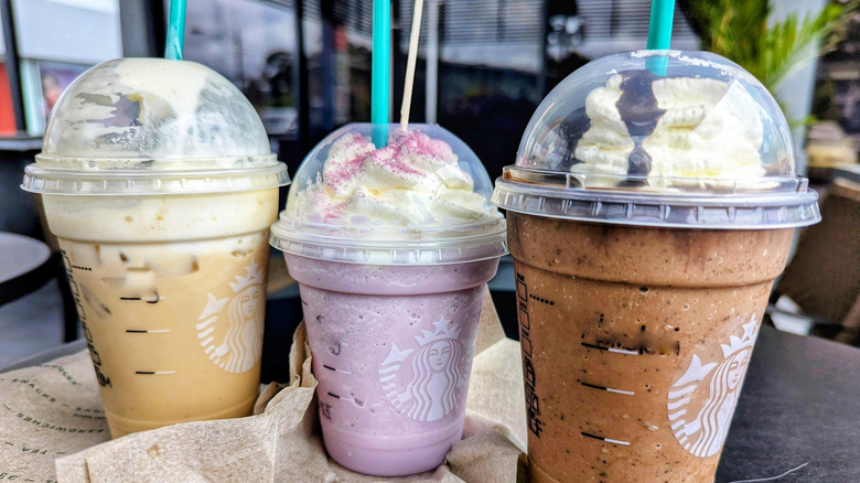 Three Starbucks Frappuccino blended beverages.
