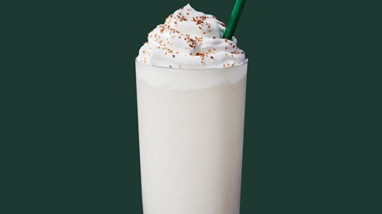 Starbucks Pistachio Creme Frappuccino on dark green background
