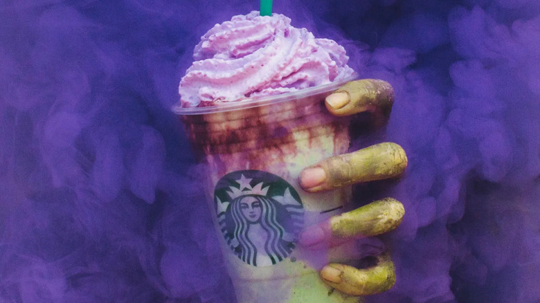 zombie hand clutching Starbucks Zombie Frappuccino