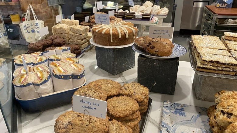 Various baked goods on display on bakery counter