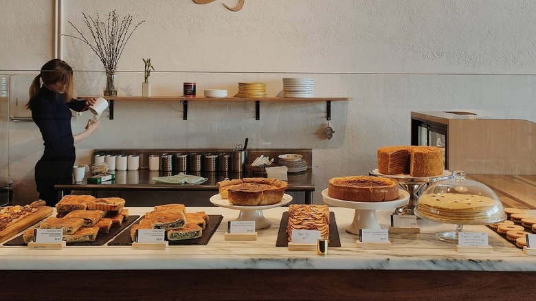 Bakery interior with various baked good on the counter