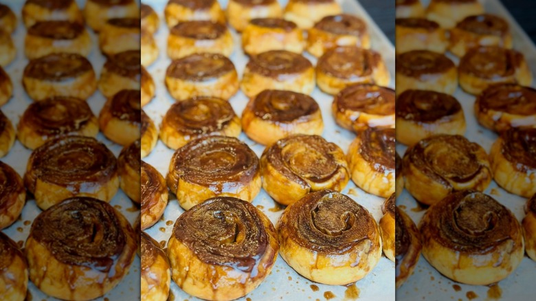 Rows of cinnamon buns on tray