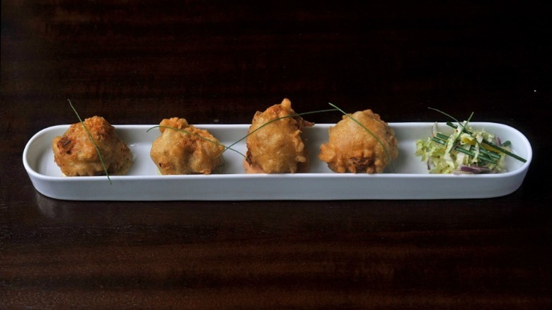 Four blue crab beignets