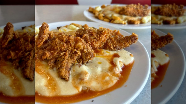 Fried chicken and cheesy poutine with gravy