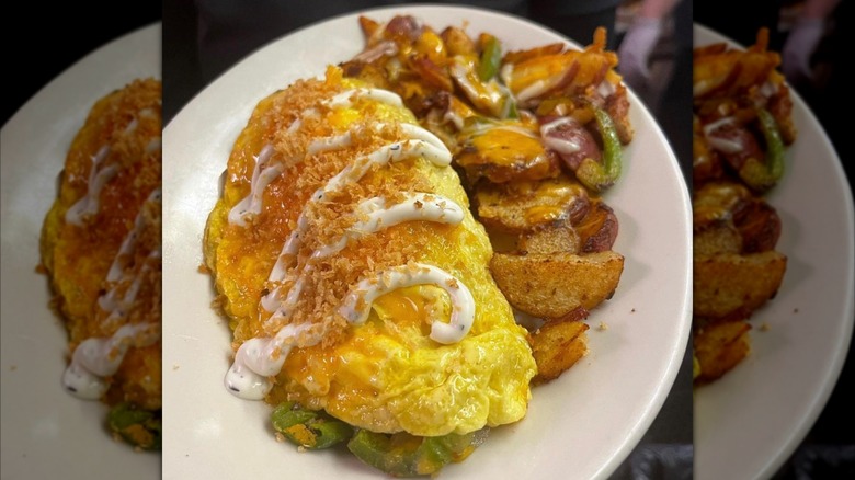 Plate with omelet and home fries
