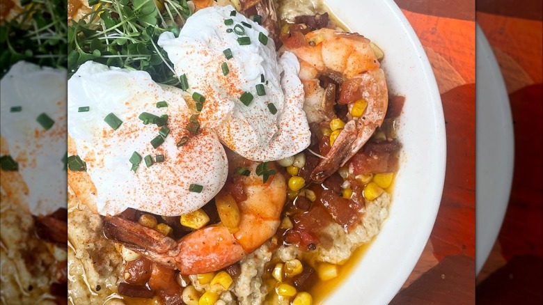Cajun brunch dish with eggs, shrimp, and polenta