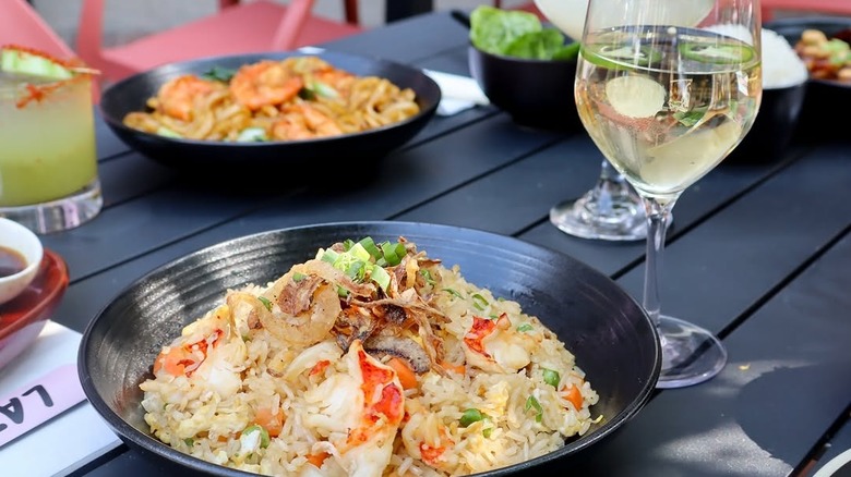 Fried rice with a glass of white wine