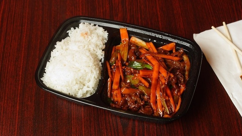 Szechuan beef with rice for take-out