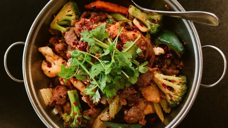 Dish in a pot topped with cilantro