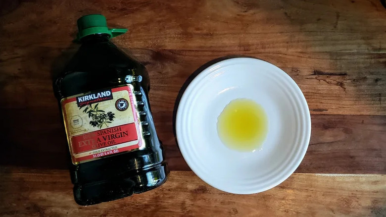 bottle of Kirkland Signature 100% Spanish extra virgin olive oil