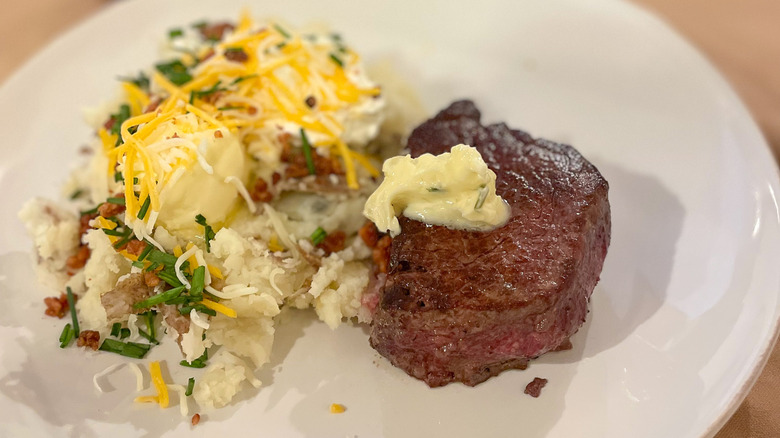 Steak with garlic butter and loaded mashed potatoes at JT's Steakhouse in Ely