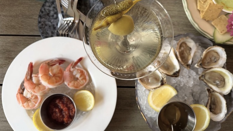 Martini with shrimp cocktail and oysters on the half shell at Judy & Harry's