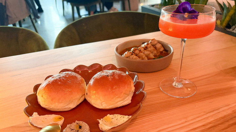 Milk bread buns, linguiça dumplings, and a floral cocktail at Terra Mae in Portland