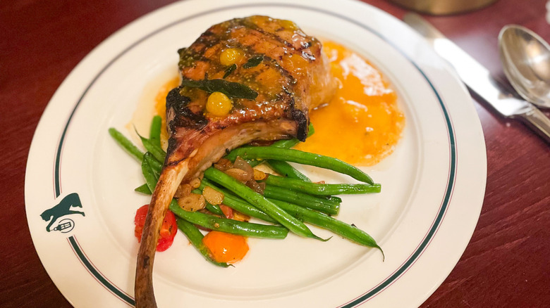 Pork chop with gooseberries, tomatoes, and haricots verts at The Left Bank in Vermont