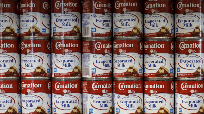Cans of Carnation evaporated milk