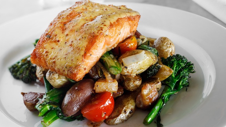 Salmon on plate with veggies
