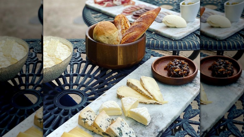 Quail with sauce drizzle on white plate
