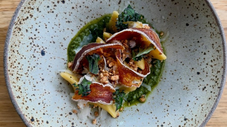 Celery Root Agnolotti on pottery plate