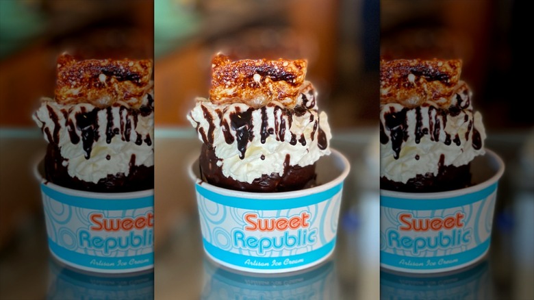 Chocolate ice cream topped with whipped cream, hot fudge, and roasted marshmallow