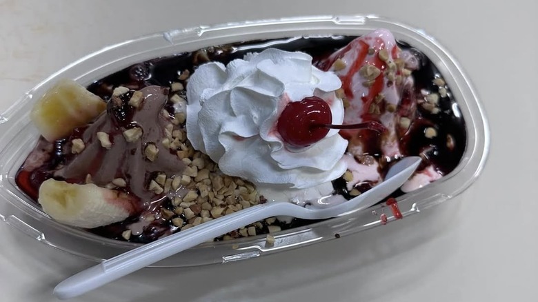 Banana split in plastic serving tray