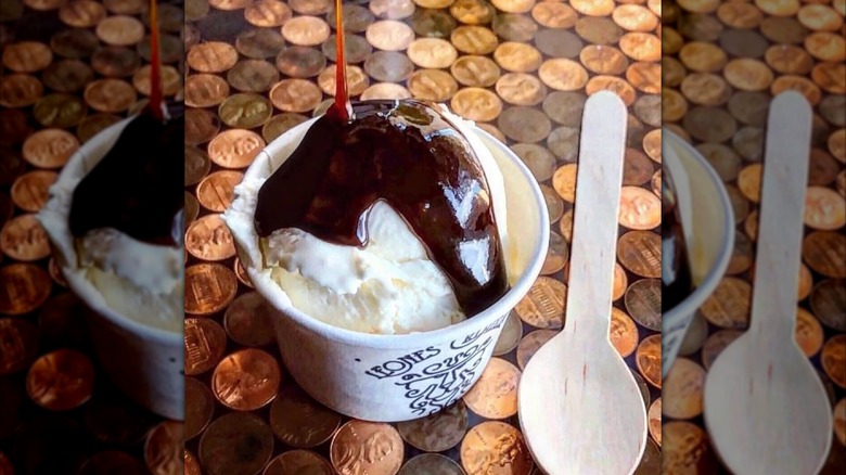 Ice cream in cup with coffee toffee sauce drizzled on top