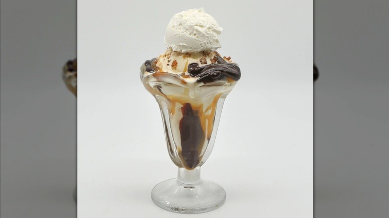 Hot fudge sundae in tall glass