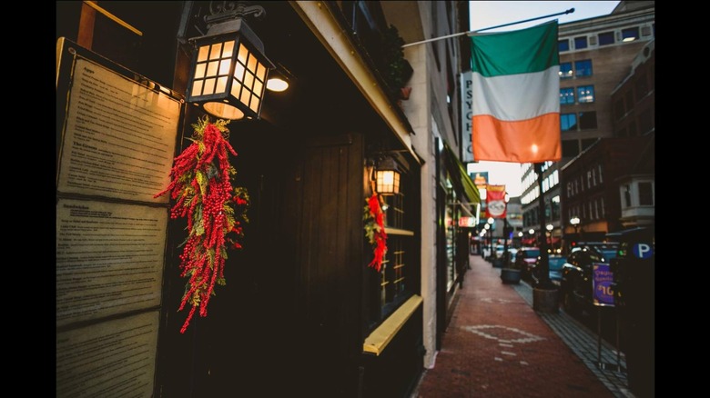 Exterior of Vaughan's with flag, lights, and decorations
