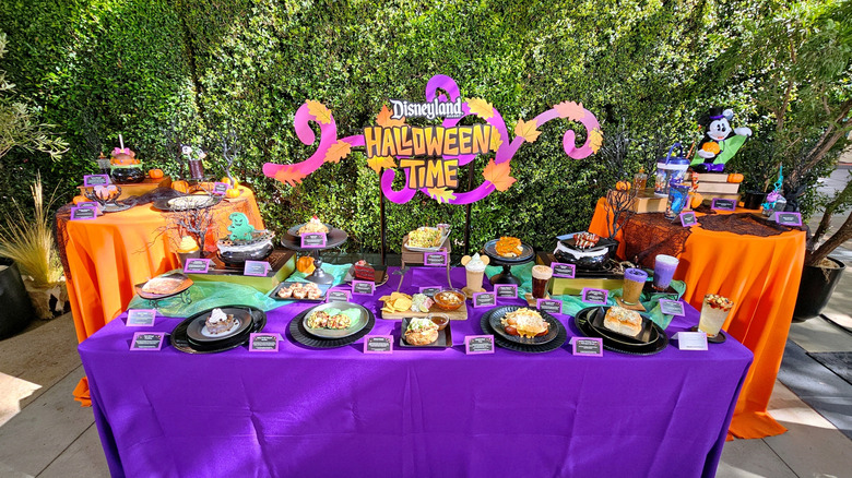 Table full of Disney's Halloween food and drinks