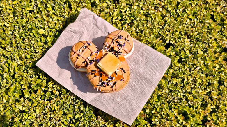 Mickey-shaped Waffle Macaron on a napkin